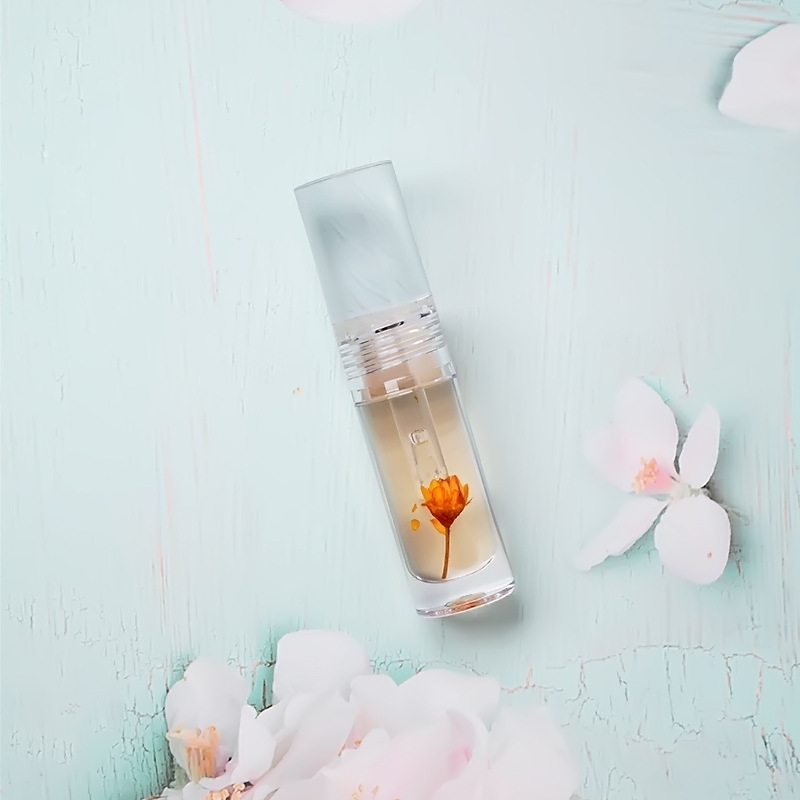 مجموعة ملمع الشفاه اللامع من بائع الأنابيب اللامعة، ملمع الشفاه الشفاف من زيت الشفاه على شكل زهرة الفتاة الصغيرة