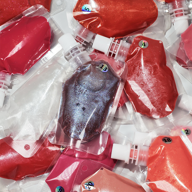 كيس بلاستيكي سعة 200 مل، كيس فوهة ملمع الشفاه، صبغة أساسية لملمع الشفاه نباتية وخالية من القسوة